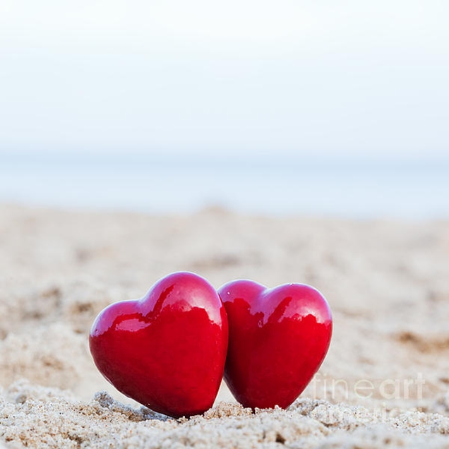 1-two-red-hearts-on-the-beach-symbolizing-love-michal-bednarek